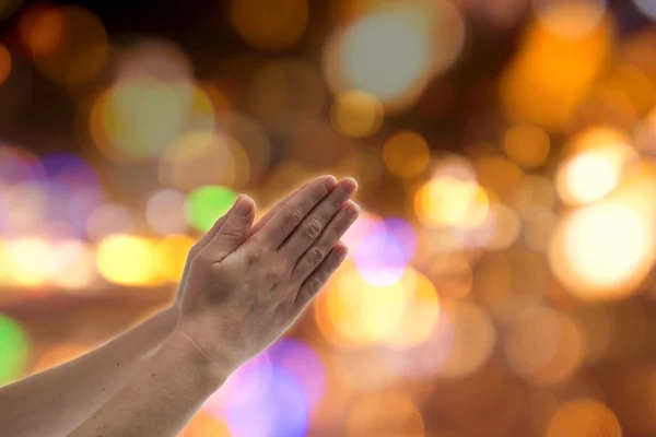 Молячись жест — стокове фото