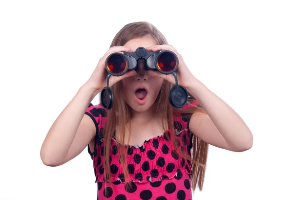 stock image Surprised teenage girl watching something with binoculars isolated on white