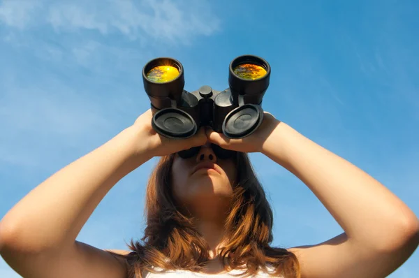 stock image Teenage girl observing nature with binoculars