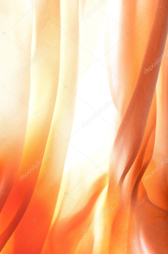 Sun shining through the curtains on beautiful summer day
