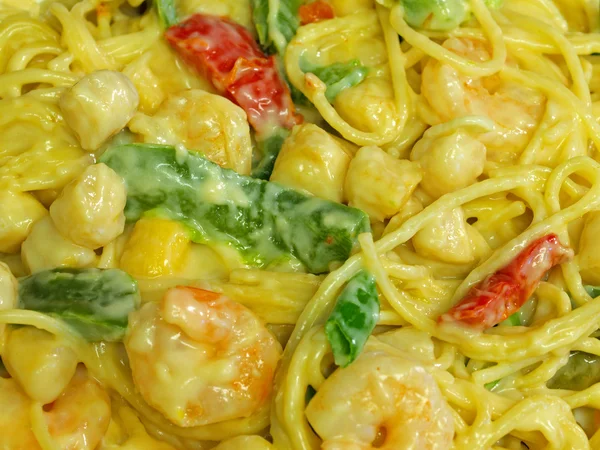 stock image Fresh Pasta and Seafood in a Cream Sauce Garnished with Green Onions