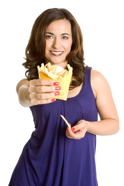 Mujer comiendo papas fritas — Foto de Stock