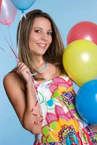 Chica sosteniendo globos —  Fotos de Stock