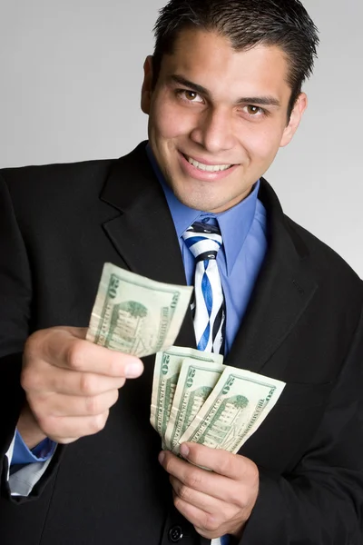 Biznesmen gospodarstwa pieniądze — Zdjęcie stockowe