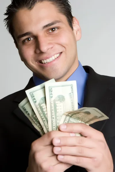 Geschäftsmann im Besitz von Geld — Stockfoto