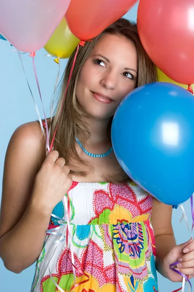 Meisje met ballonnen Stockafbeelding