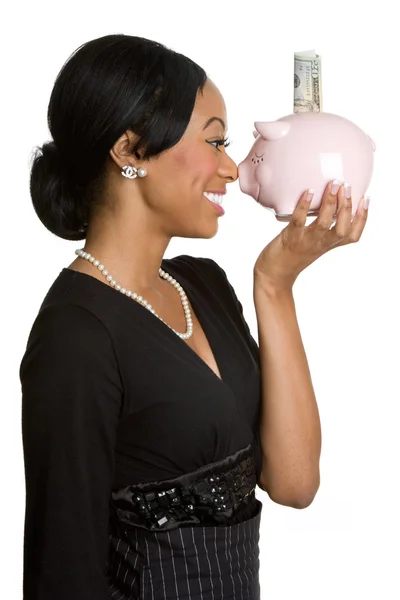 Женщина, держащая свиной банк — стоковое фото
