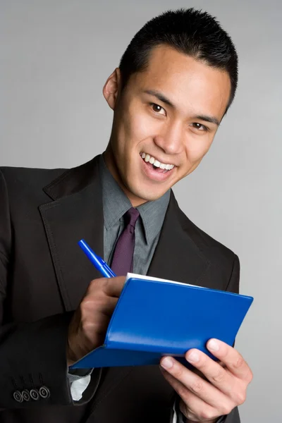 Młody biznesmen z notebookiem — Zdjęcie stockowe