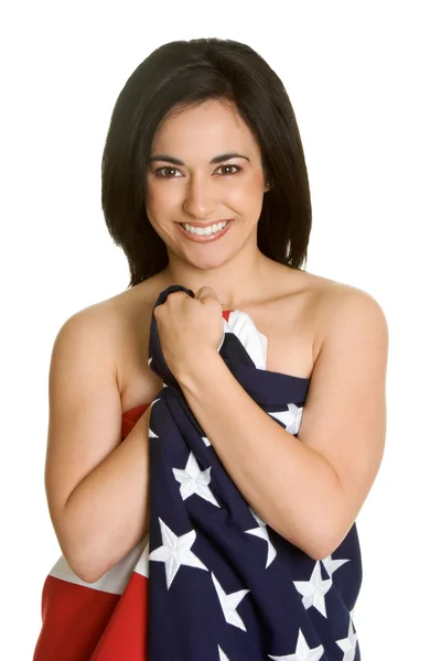 Femme enveloppée dans le drapeau des États-Unis Images De Stock Libres De Droits