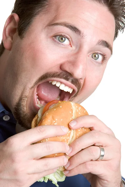 Mann isst Burger — Stockfoto