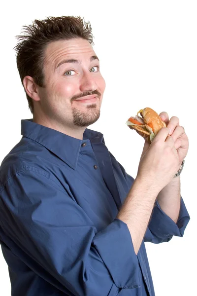 Adam yeme hamburger — Stok fotoğraf
