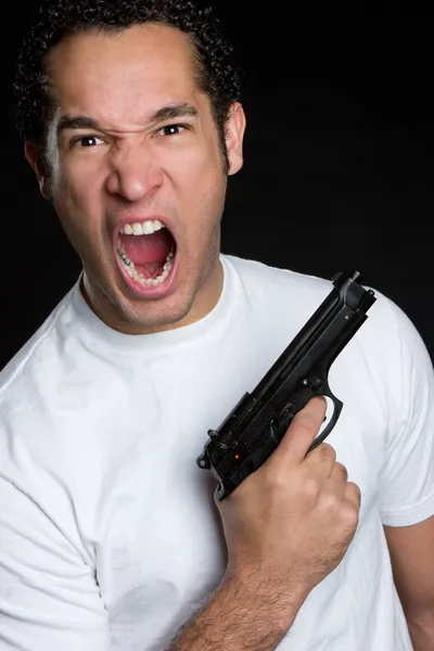 Homme en colère tenant un pistolet — Photo