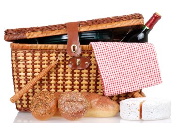 Picnic basket with bread cheese and wine clipart