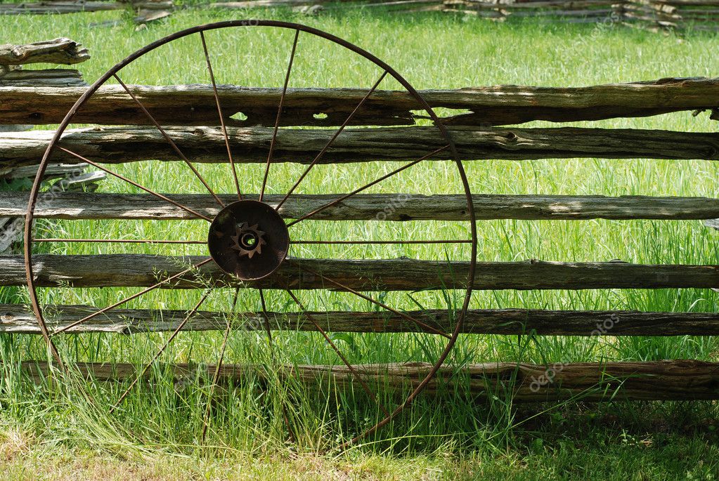 Old metal wagon wheel Stock Photo by ©mcgphoto 11028918