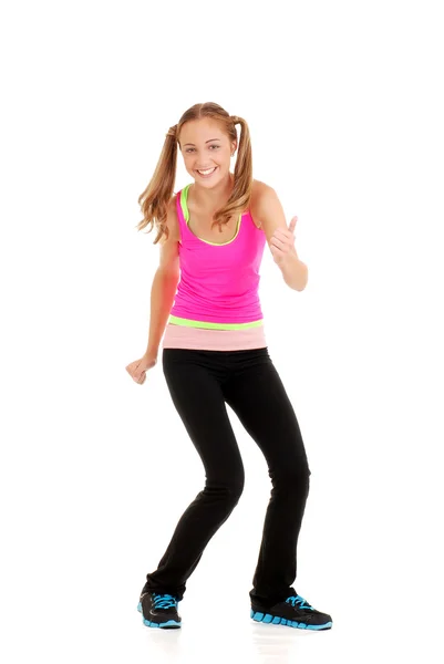 Dospívající dívka s růžový top cvičení zumba fitness — Stock fotografie