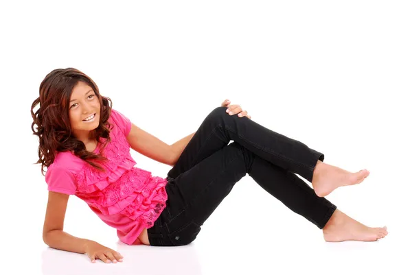 Ung flicka med rosa topp om fastställande — Stockfoto