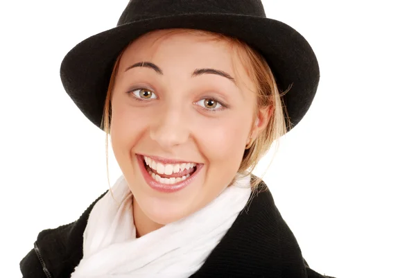 Surprised teen girl in hat and scarf — Stock Photo, Image