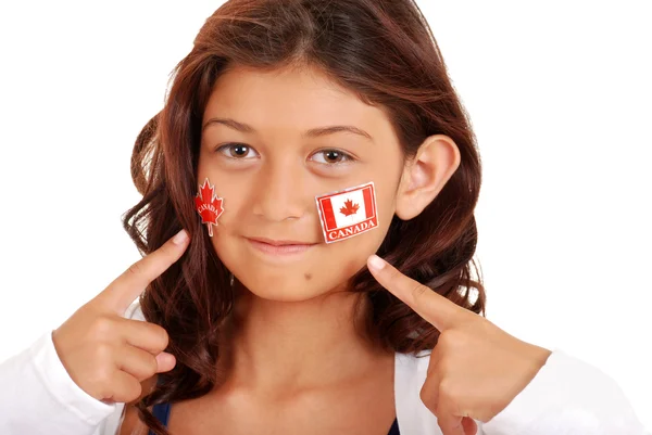 Young girl with Canada day stickers on face — Stock Photo, Image
