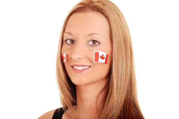 Young woman with canada stickers on face — Stock Photo, Image