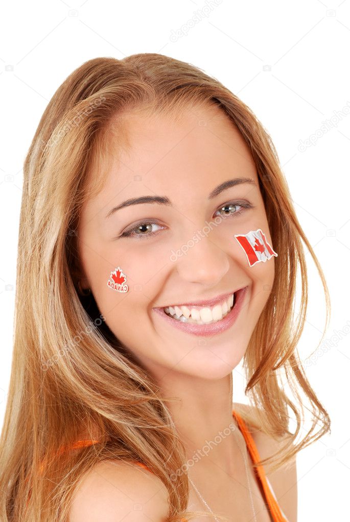 Happy teen girl wearing canada day stickers