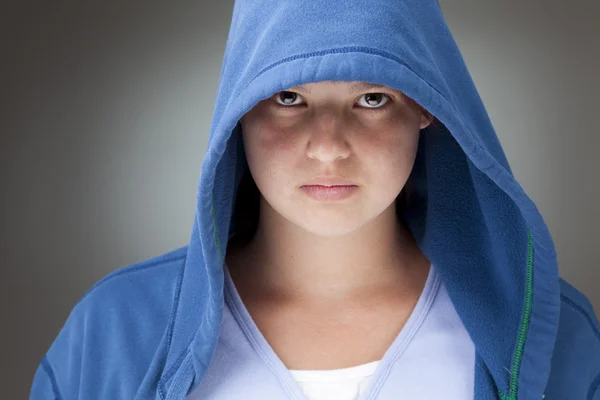 Girl in a hooded jacket — Stock Photo, Image