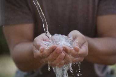 Man Catching Water clipart