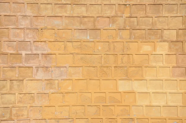 オレンジ色の背景の古い壁 — ストック写真