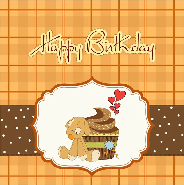 Ευχετήρια κάρτα γενεθλίων με cupcake και το κουτάβι παιχνίδι — Φωτογραφία Αρχείου