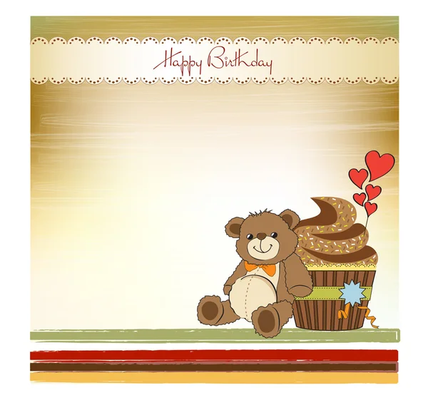 Поздравительная открытка с кексом и плюшевым мишкой — стоковое фото