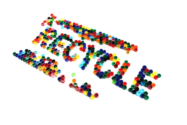 色のプラスチック製のキャップから単語リサイクル — ストック写真