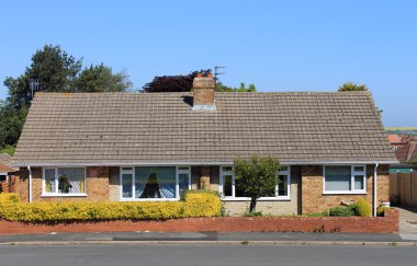 Two semidetached English bungalow houses clipart