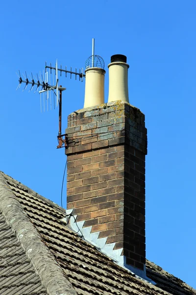 Chimney on roof — Stockfoto