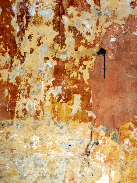 Textura da parede velha com rachaduras e pintura pobre . — Fotografia de Stock