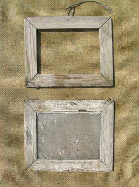 Two old wooden picture frame on the surface texture of burlap. T clipart