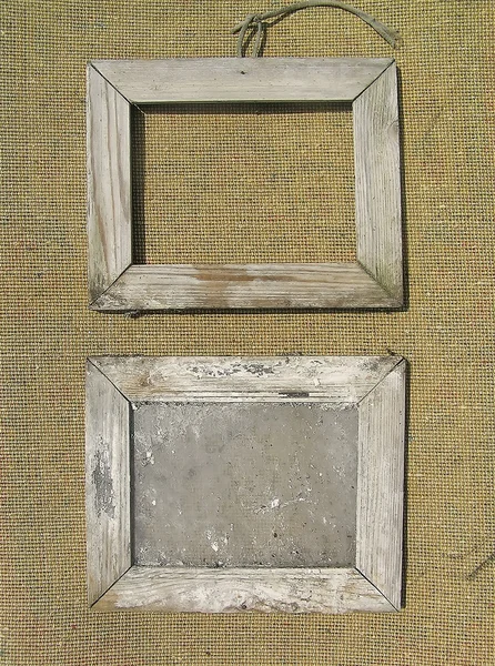 Twee oude houten beeld frame op de structuur van het oppervlak van jute. t — Stockfoto