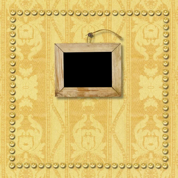 Old wooden picture frame hanging on the wall. — Stock Photo, Image