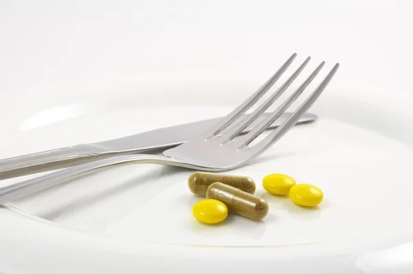Їжа таблеток — стокове фото