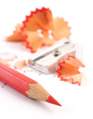 Red crayon wiht shavings clipart