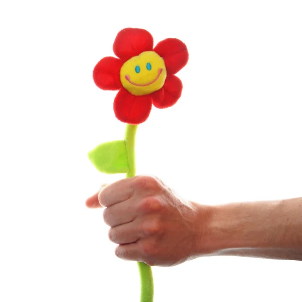Ruka držící květinu — Stock fotografie