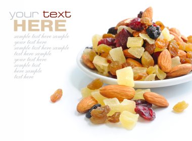 Mix nuts and dry fruits on a white background clipart