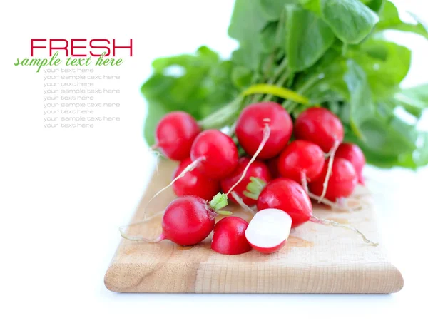 Fresh radish on a wooden board isolated on white background — Stock Photo, Image
