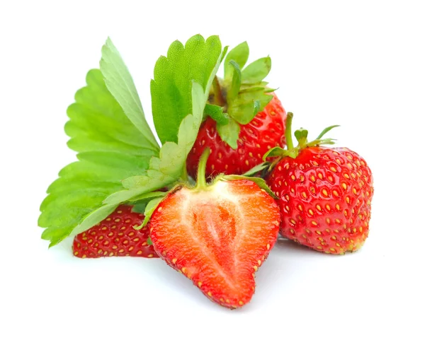 Strawberries with leaves on a white background — Stock Photo, Image
