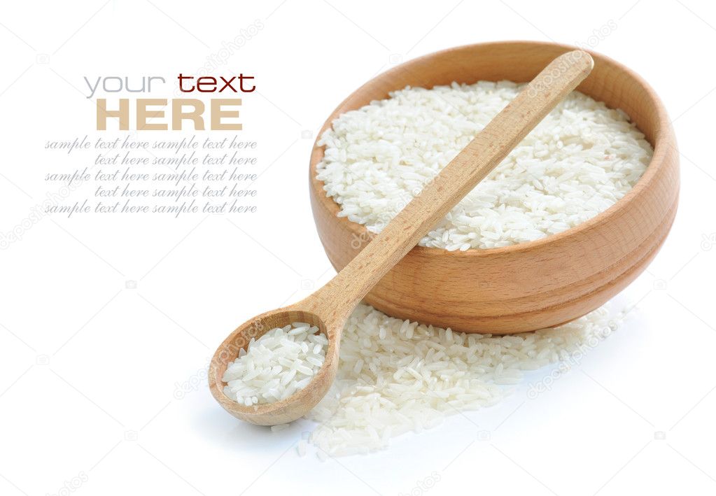 Rice in wooden bowl and spoon isolated on white background