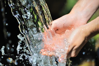 Woman hands with water splash clipart