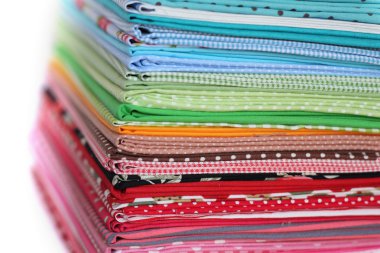 Pile of colorful cotton textile background clipart