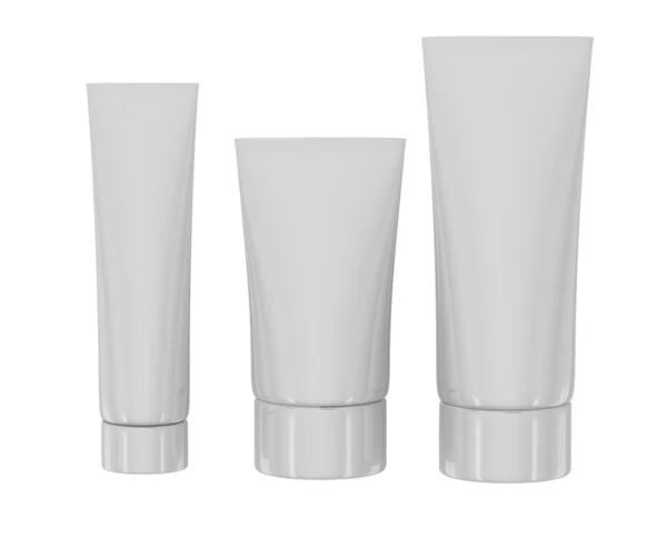 Tubos cosméticos brancos no fundo branco — Fotografia de Stock