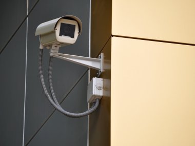 Camera on a wall clipart