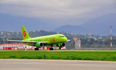 Boeing-737-800, passenger airliner of S7 airlines («Siberia») on the platform of the International Sochi airport on August 16, 2012 in Sochi, Russia clipart