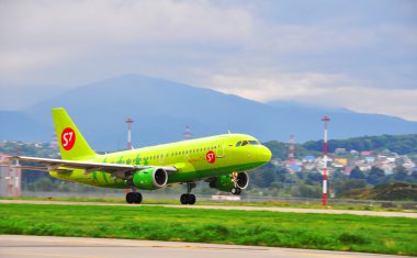 Boeing-737-800, passenger airliner of S7 airlines («Siberia») on the platform of the International Sochi airport on August 16, 2012 in Sochi, Russia