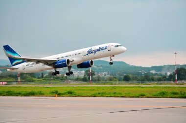 Boeing-757-200 of “Yakutia” airlines on rise clipart